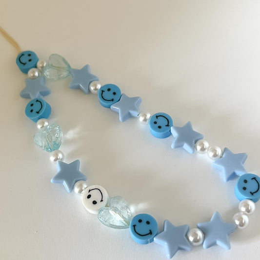 Blissful Face Phone Charm